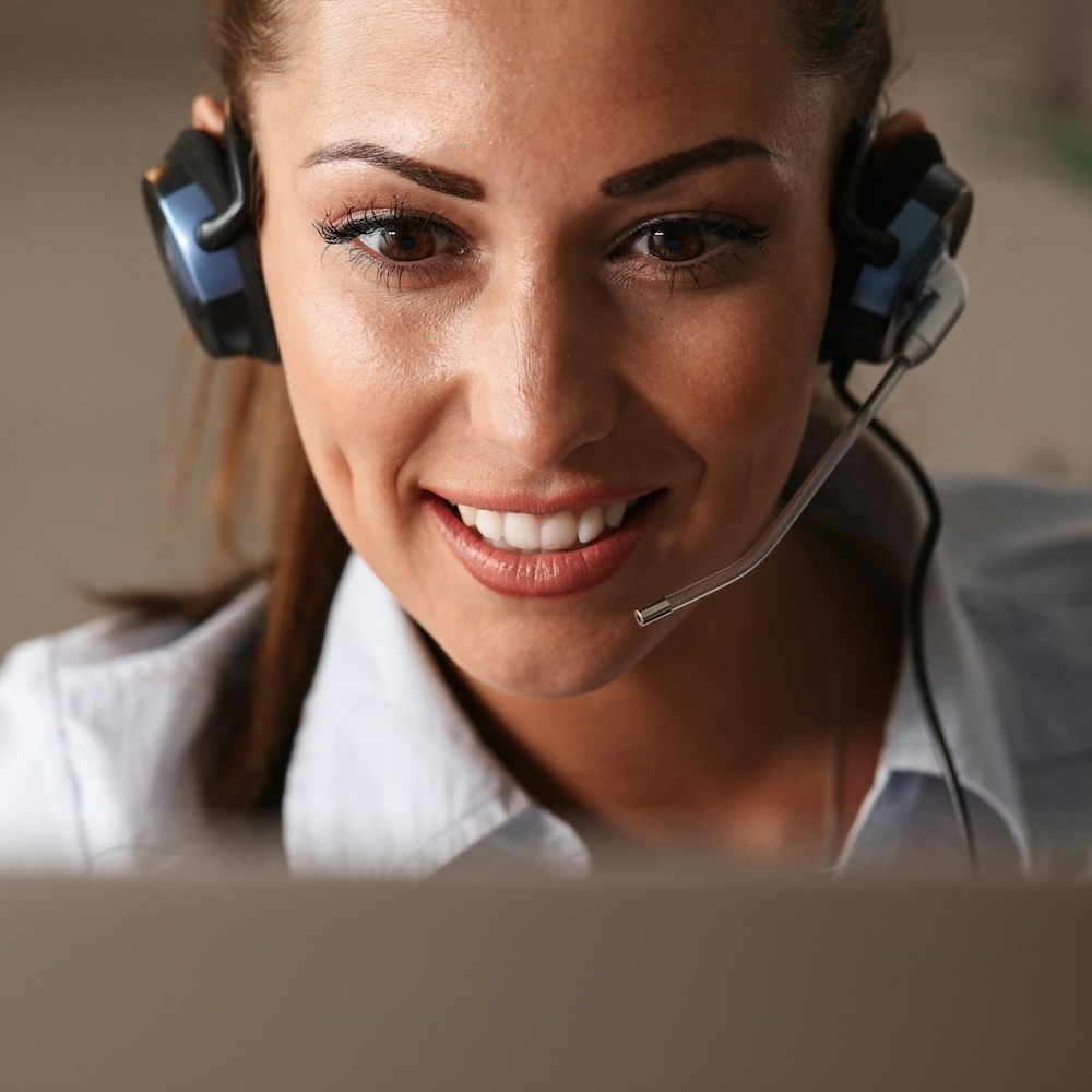 Live receptionist wearing a headset